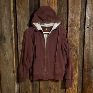 Carhartt women’s medium Sherpa lined maroon/rust colored hoodie.